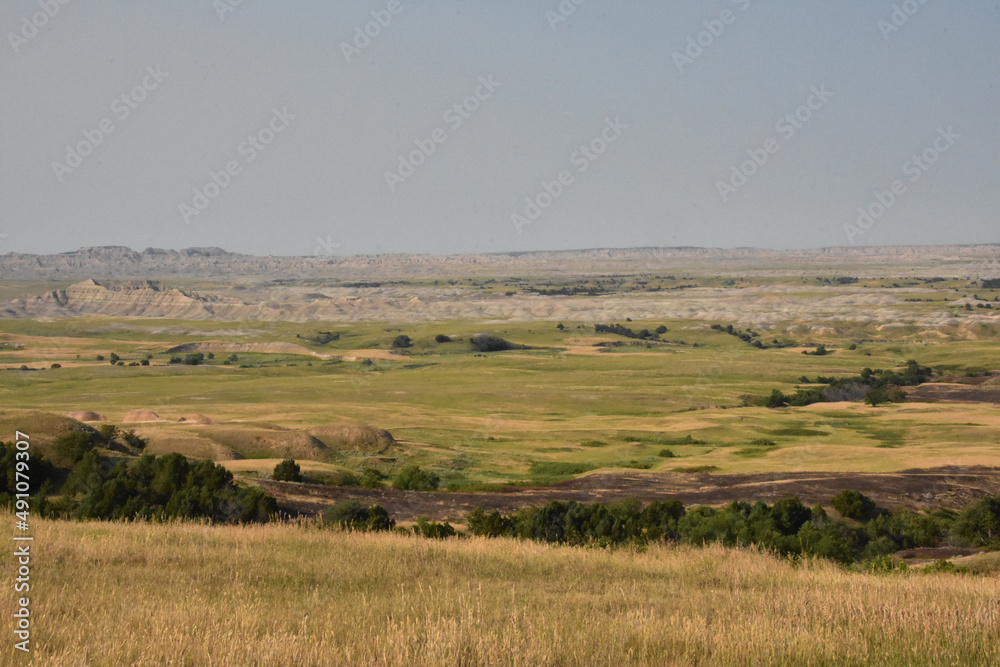 Badlands Landscape with a Valley in South Dakota