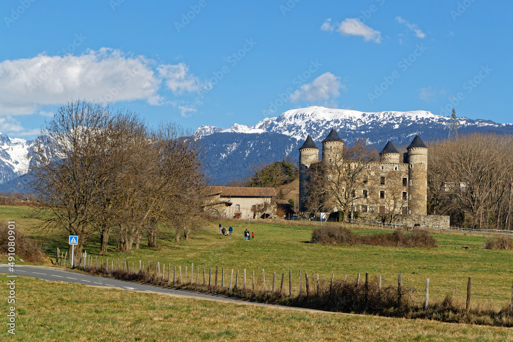JARRIE, FRANCE, February 27, 2022 : Castle of Bon Repos is a former strong house of XV century. Here with Chamrousse summit in the background