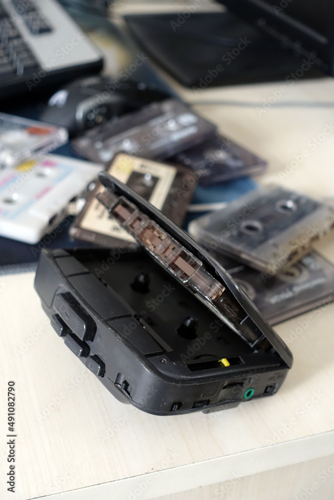 Fototapeta premium Indispensable classic cassette player of the 90s, Walkman, cassette player that is no longer used,