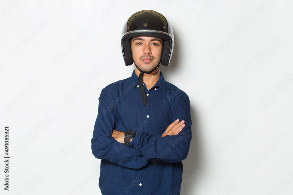 handsome man with a motorcycle helmet showing a thumbs up ok gesture on white background
handsome man with a motorcycle helmet showing a thumbs up ok gesture on white background