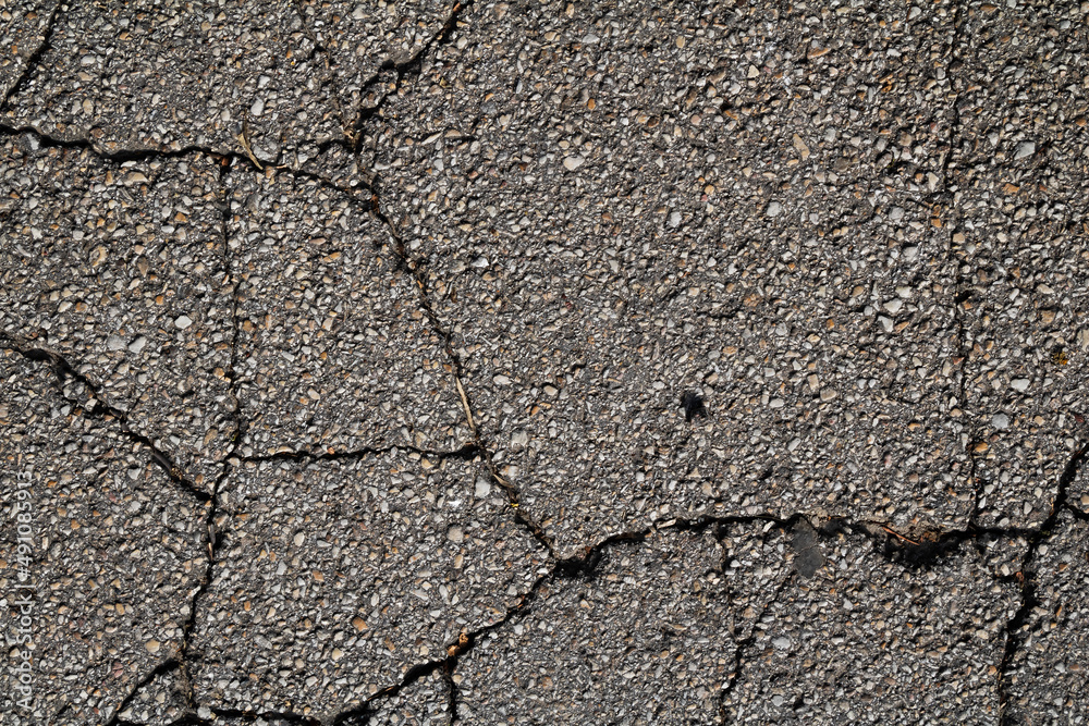 Cracked and abstract grunge texture. Aged material surface backdrop. Weathered effect pattern. Old and dirty background. Cracked and abstract grunge texture. Aged material surface backdrop. Weathered effect pattern. Old and dirty background.
