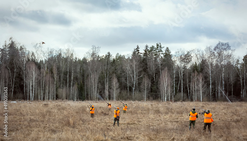 Fotografia, Obraz A group of hunters hunt pheasants