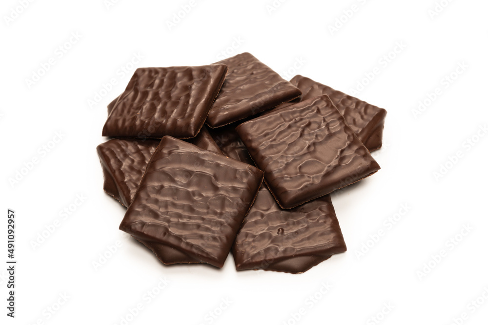 Dark chocolate candies isolated on white background. Dark chocolate candies isolated on white background.