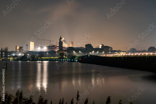 Panoramic night view of the city of Mantua between the middle and lower lakes