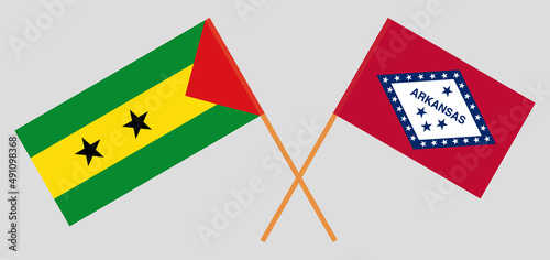 Crossed flags of Sao Tome and Principe and The State of Arkansas. Official colors. Correct proportion