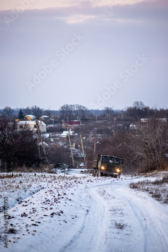 car ride to the village . Winter road to the village . Snow on the road 