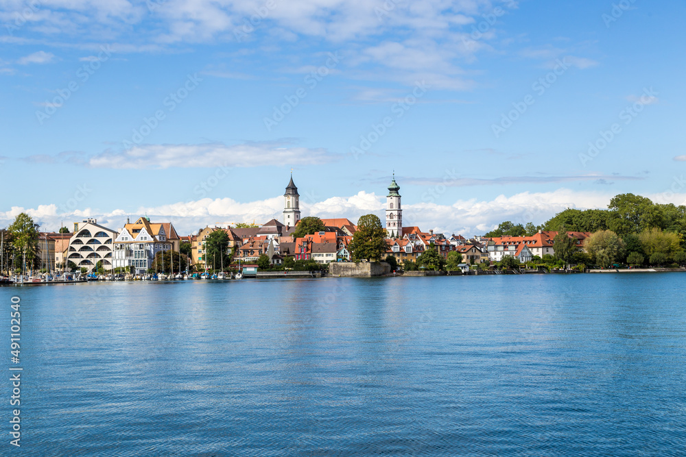 Lindau, Germany. Scenic view of the embankment with bell towers from Lake Constance