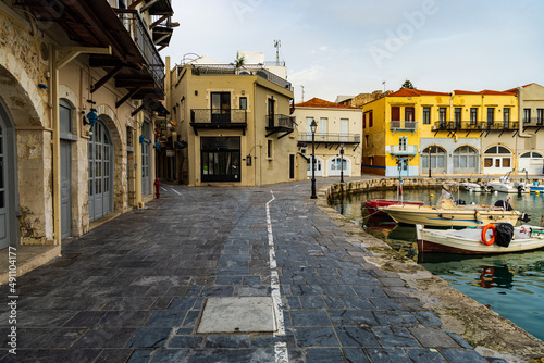 Beautiful and calm morning at the greek harbor of Rethymno with fisher boats in Crete, Greece © SuddenDave