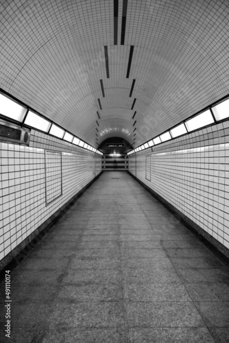 Empty underground subway commuter hallway
