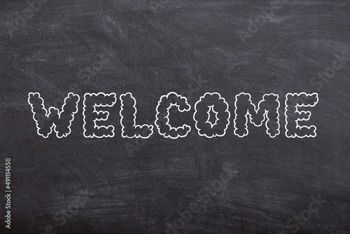 Welcome sign on school board hand written