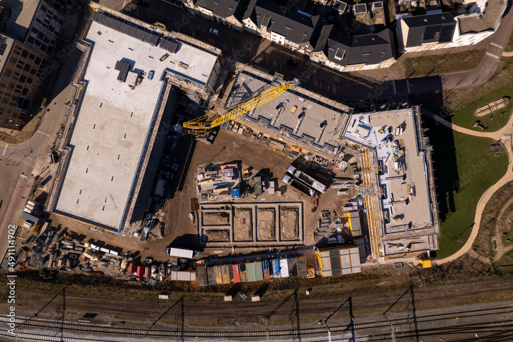 Top down view of construction site Ubuntuplein seen from above in urban development of real estate investment project. Aerial housing and engineering concept.