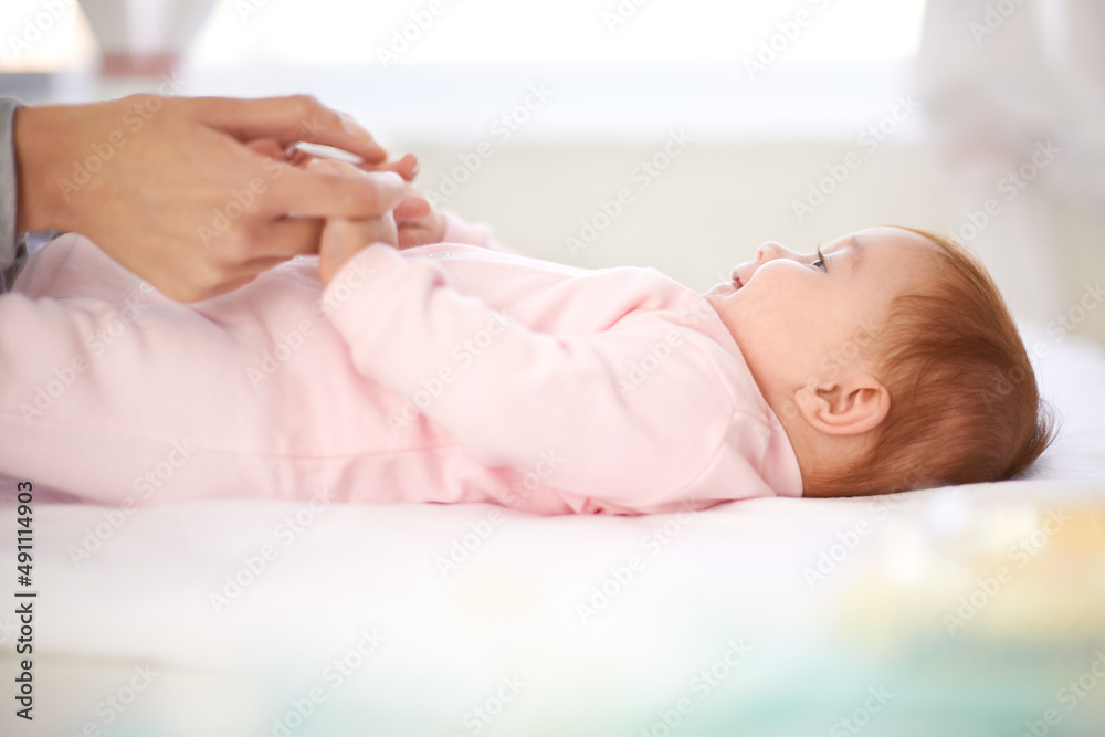 Mommy just close your nose before we do this. Loving mother caring for her baby girl. Mommy just close your nose before we do this. Loving mother caring for her baby girl.
