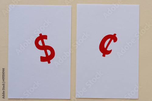 money sign and cent sign on paper photo