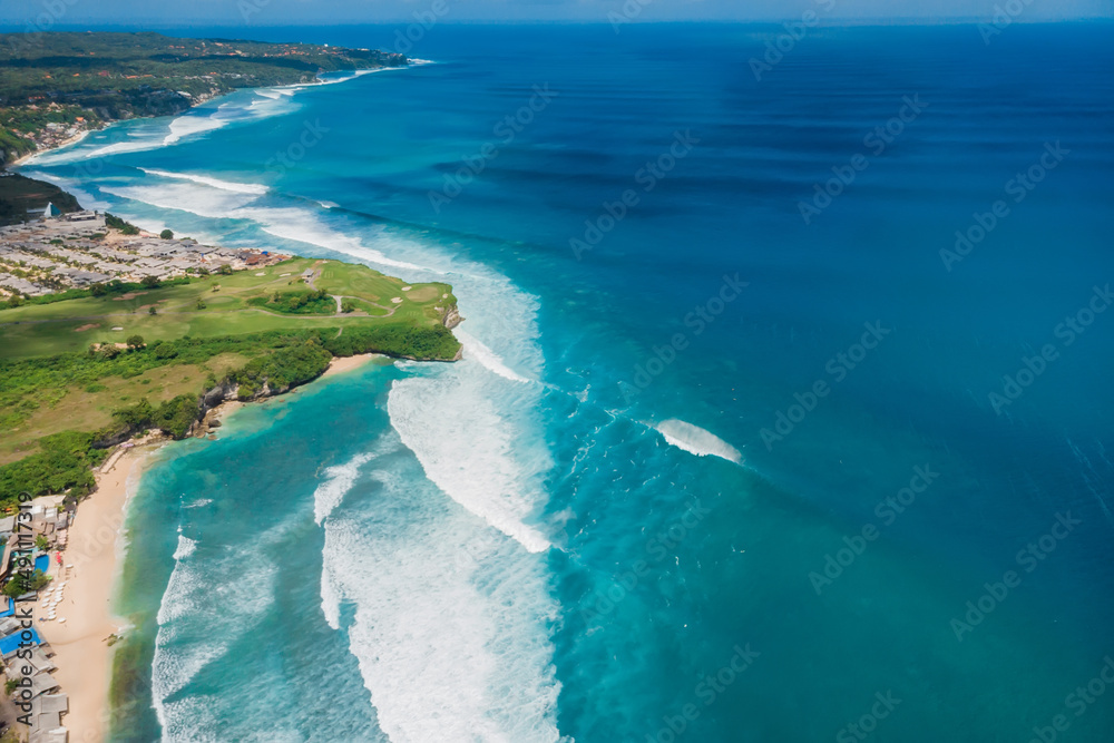 Aerial view of waves for surfing. Perfect ocean waves in Bali