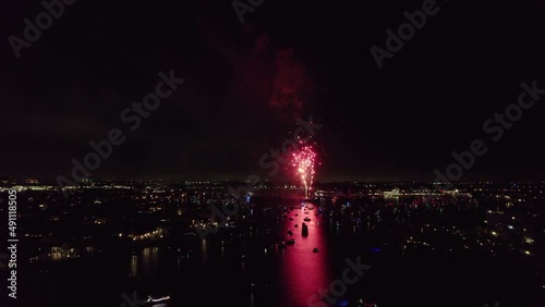 Aerial Fireworks Footage at night over water