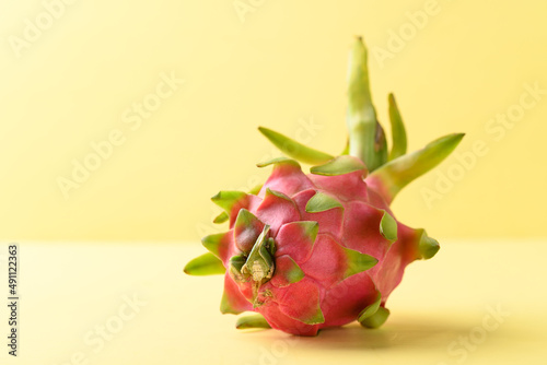 Fresh dragon fruit or pitaya on yellow background  Tropical fruit