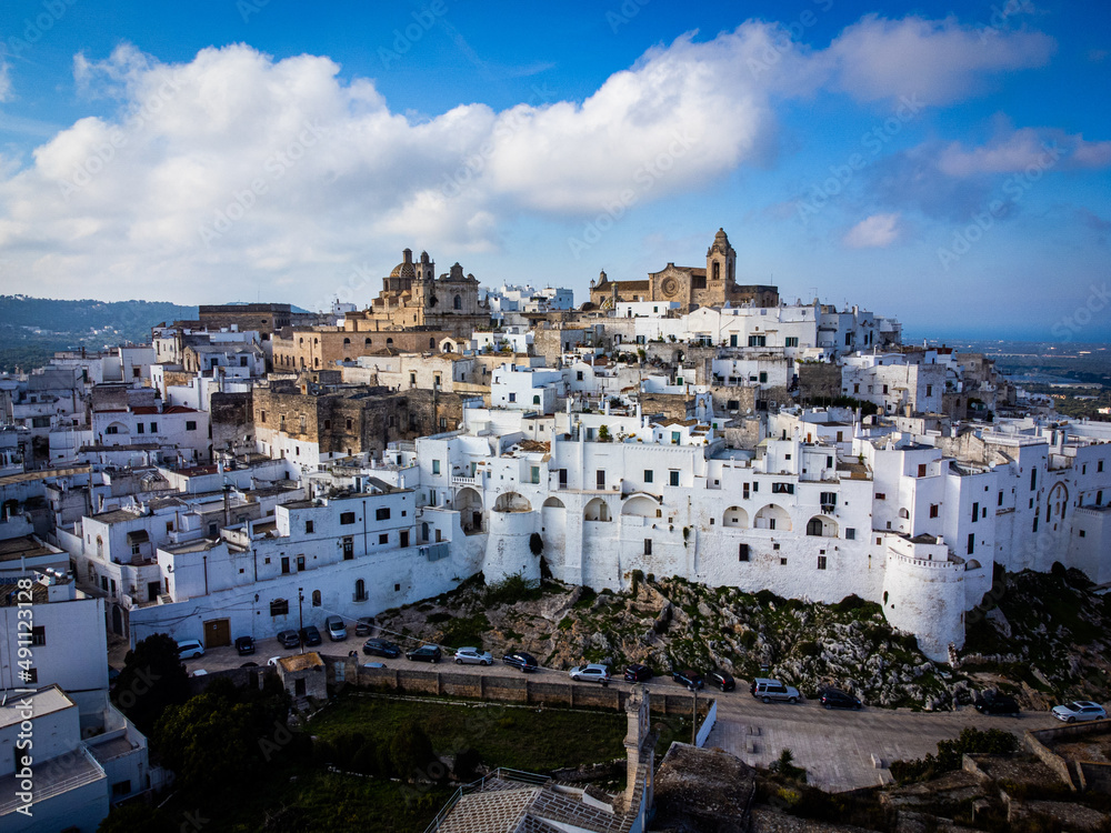 The famous white houses of Ostuni in Italy - aerial view - travel photography