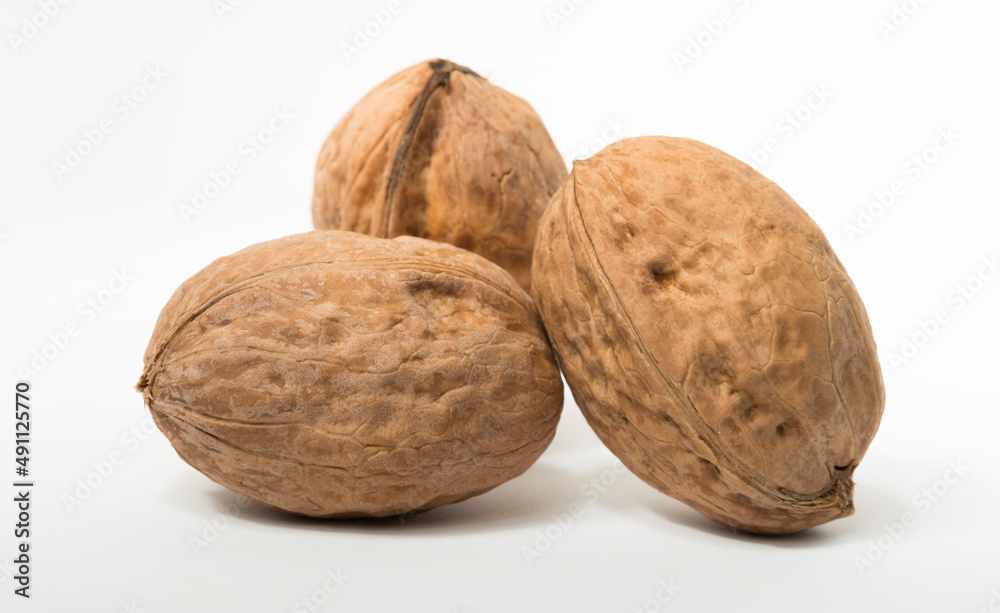 Walnuts are rounded, single-seeded stone fruits of the walnut tree. Walnuts are rounded, single-seeded stone fruits of the walnut tree.