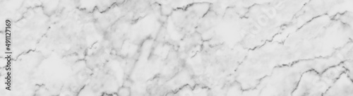 Panorama white marble stone texture for background or luxurious tiles floor and wallpaper decorative design. © Nisathon Studio