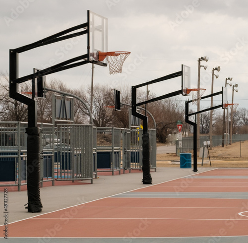 Outdoor basketball goals on a cloudy day