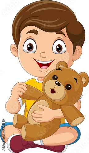 Cartoon little boy playing teddy bear