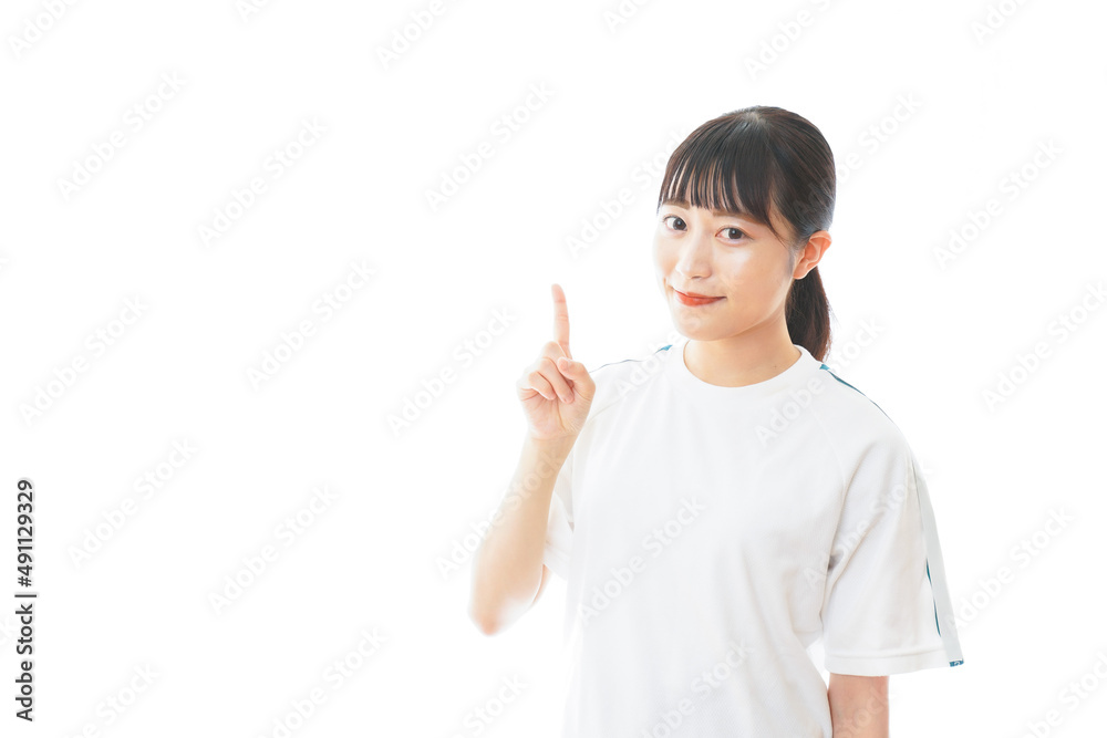 体操服で指をさす若い女子学生 体操服で指をさす若い女子学生