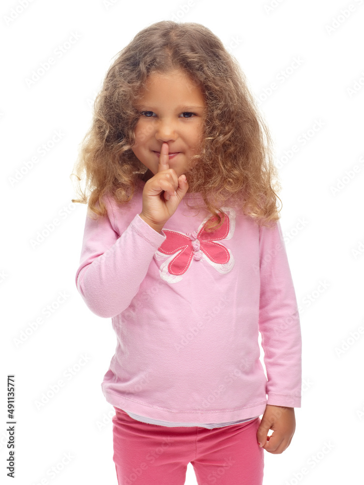 Ssh, I wont tell if you dont. Cute little girl making a ssh gesture against a white background. Ssh, I wont tell if you dont. Cute little girl making a ssh gesture against a white background.
