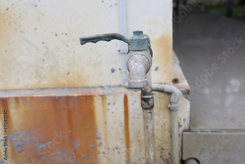 defocused old PVC Plastic Water Faucet