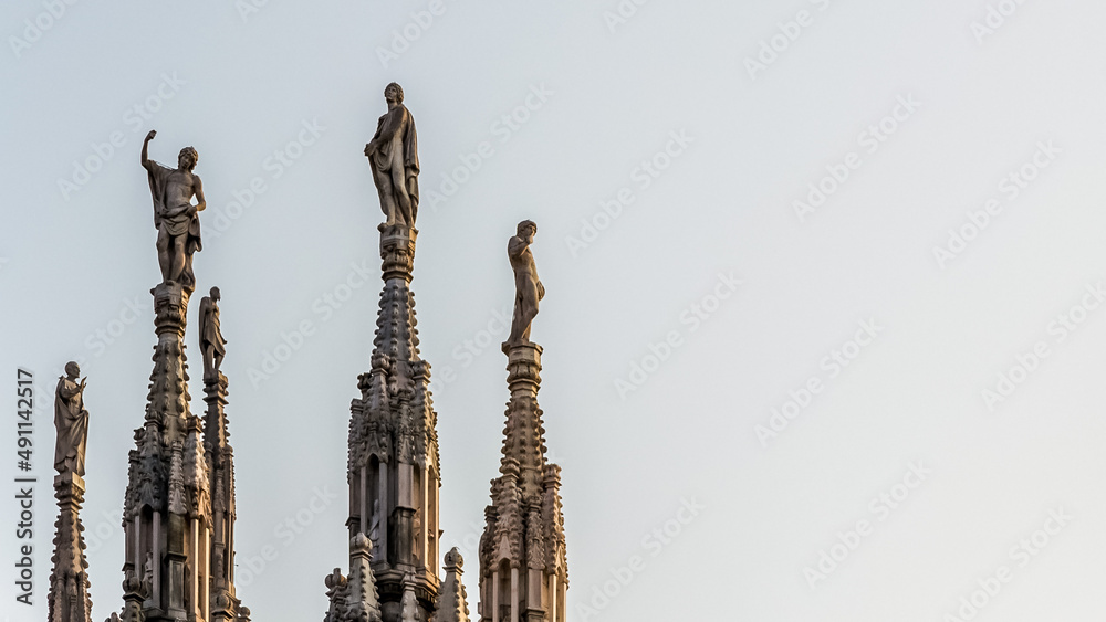 Architectural detail of The Milan Cathedral (Italian, Duomo di Milano), the cathedral church of Milan in Lombardy, Italy. Dedicated to the Nativity of St Mary it is the seat of the Archbishop of Milan