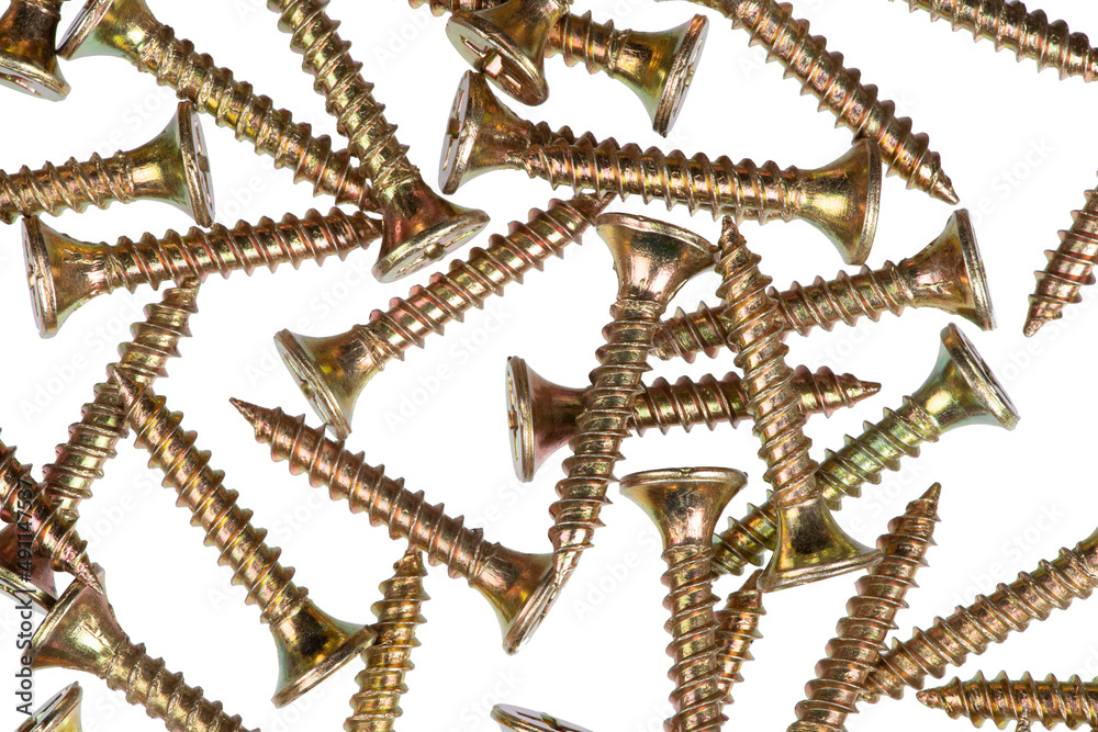 Assortment of copper and aluminum screws isolated, white background Assortment of copper and aluminum screws isolated, white background