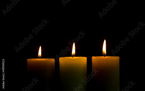 Warm candlelight on a dark mysterious background