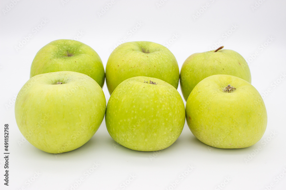 Few green apples on white background Few green apples on white background