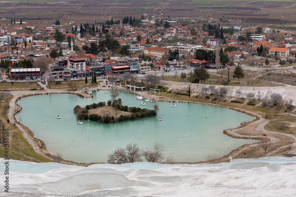 Carbonate travertines the natural pools during sunset, Pamukkale, Turkey