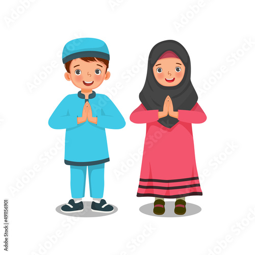 happy little Muslim kids boy and girl with welcoming gesture putting palms together showing thank respect greeting poses celebrating Ramadhan 