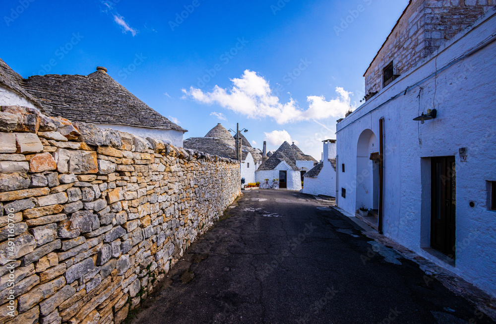 Historic Trulli houses in the city of Alberobello in Italy - a tourist attraction - travel photography