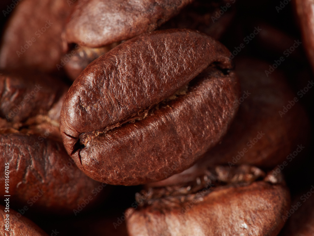 Coffee beans. On a black background. Top view. Space for copying. Coffee beans. On a black background. Top view. Space for copying.