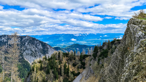 Panoramic view in spring near Frauenkogel on mountain peaks in the Karawanks, Carinthia, Austria. Borders Austria, Slovenia, Italy. Triglav National Park. Alpine meadows. Alm. Snow fields melting © Chris