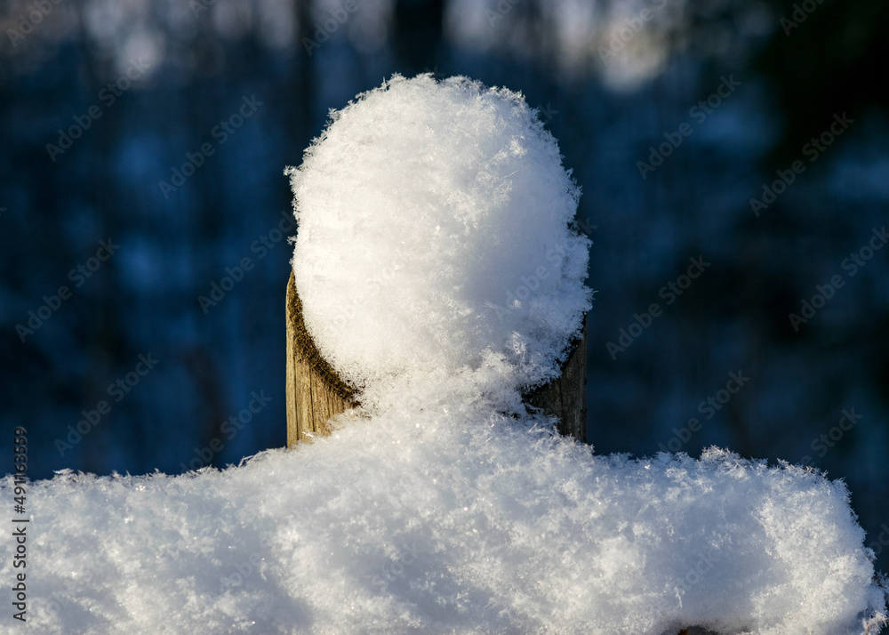 close-up view of snow with snowy wooden fence posts, snow texture close-up view of snow with snowy wooden fence posts, snow texture