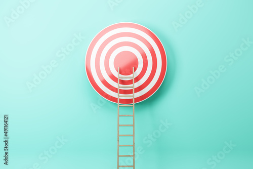 Creative ladder leading to bulls eye target on blue wall background. Targeting, career and aim concept. 3D Rendering.