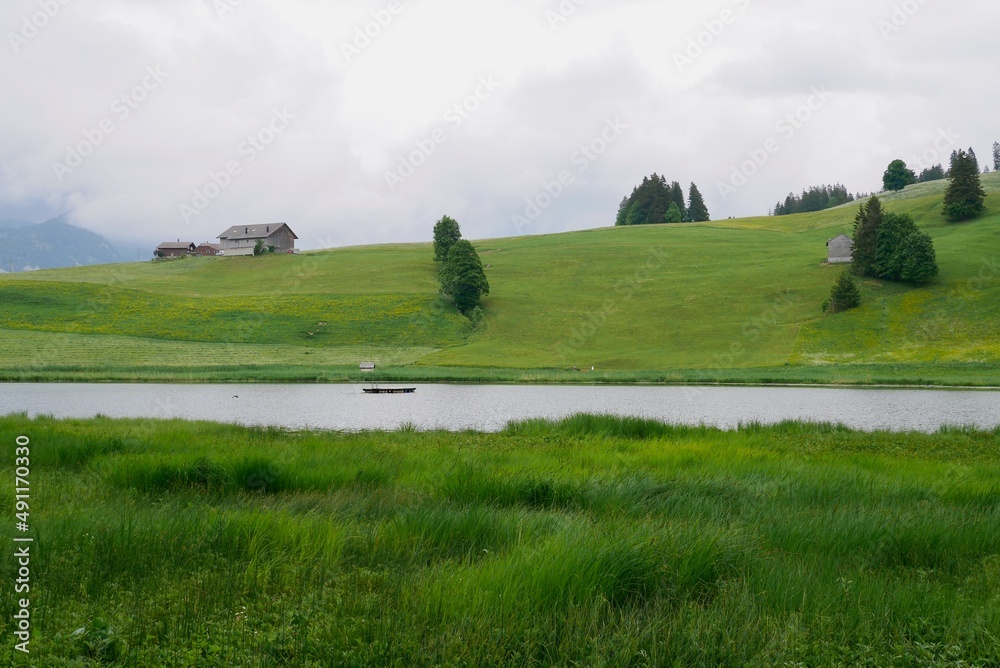 Naklejka premium Alpine mountain lake Schwendisee in Toggenburg. St. Gallen, Switzerland.