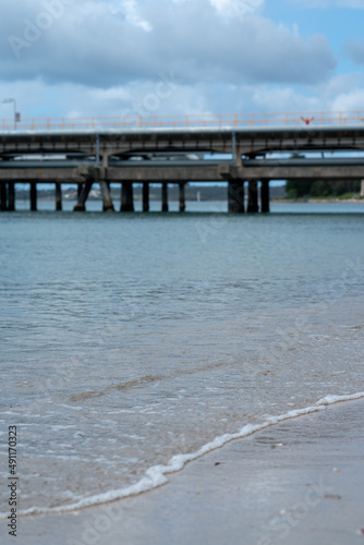 water flowing into the water at the beach  landscape