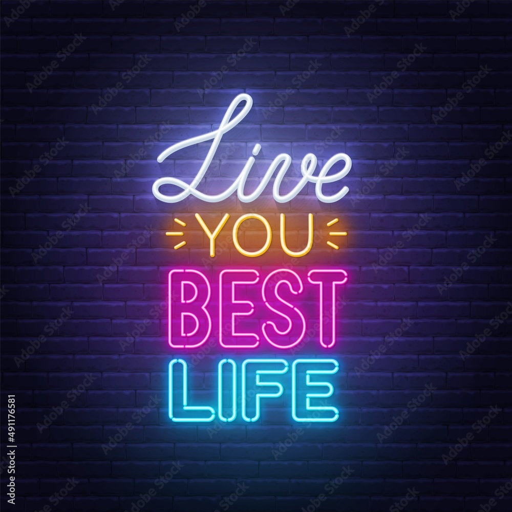 Live You Best Life neon lettering on brick wall background.