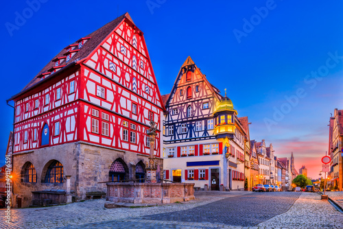 Obraz na płótnie Rothenburg ob der Tauber, Bavaria, Germany. Medieval town of Rothenburg at night. Marktplatz fountain and Marien apotheke. w salonie