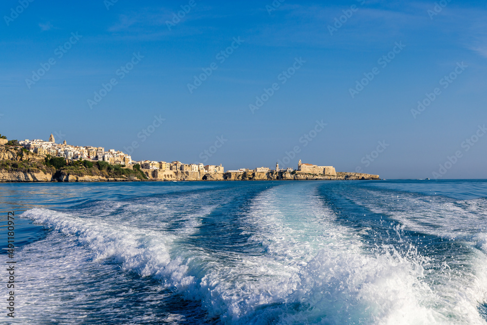 italian cityscape from the water with waves