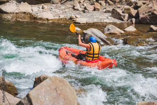 inflatable raft extreme sport at mountain river