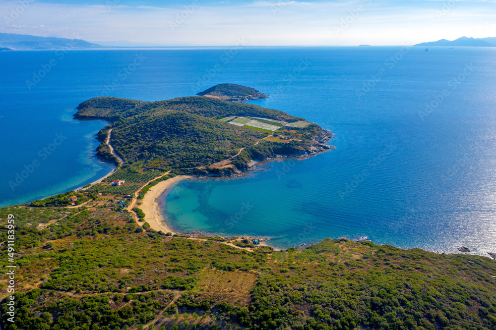 Aerial panorama of summer seascape of Mediterranean sea. Green hills of Peloponnese peninsula, Greece, Europe.