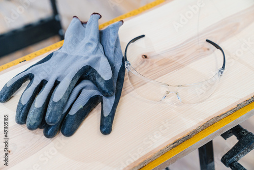 Photography protective gloves and glasses for working with wood on the planing machine