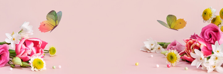 Beautiful spring and summer flowers and butterflies on pink banner. Spring Easter or summer holiday background