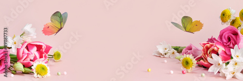 Beautiful spring and summer flowers and butterflies on pink banner. Spring Easter or summer holiday background