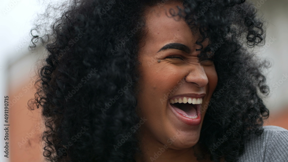 A Happy black woman laughing and smiling a happy African person real life laugh and smile A Happy black woman laughing and smiling a happy African person real life laugh and smile